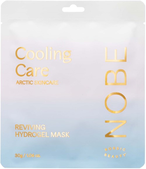 Förpackningen visar en hydrogelmask för kyla, från Arctic Skincare, med guldiga bokstäver på en pastellbakgrund.