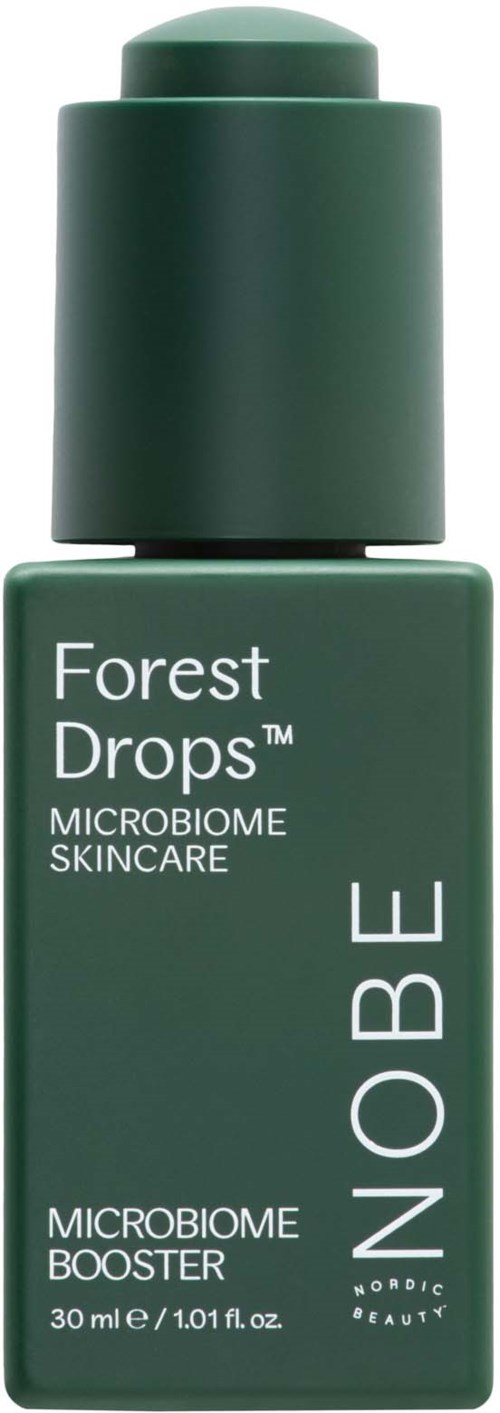 Grön flaska med Forest Drops mikrobiom hudvård med pump.