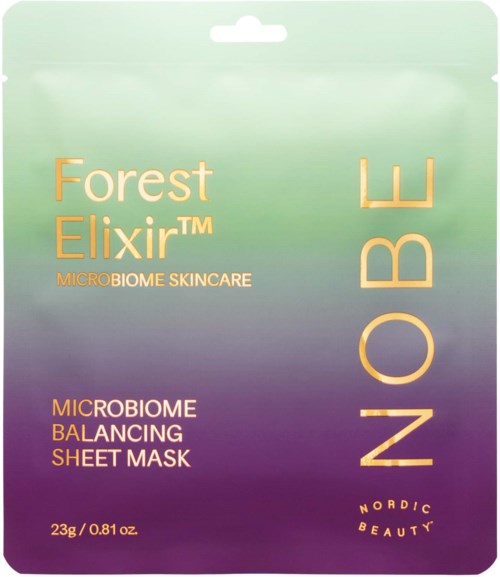 En vårdmaskförpackning märkt 'Forest Elixir' med lila och gröna färger och text om microbiombalans.