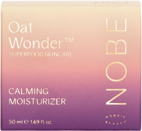En rosa och lila förpackning med text för Oat Wonder lugnande fuktkräm, 50 ml, från Nordic Beauty.