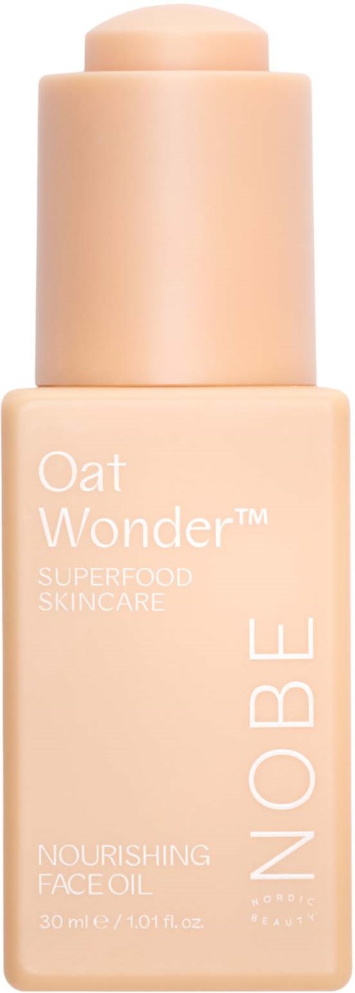 En beige flaska med närande ansiktsolja som heter Oat Wonder av NOBE, volym 30 ml, med pump.