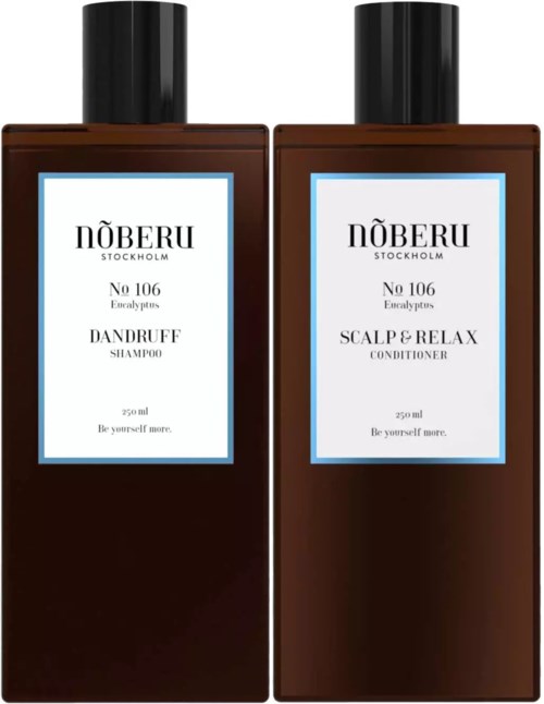 Two brown bottles of shampoo and conditioner, labeled 'NÖBERU Stockholm' with black caps.