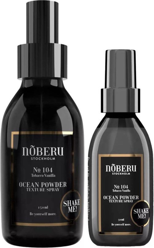 Two black spray bottles with gold and white labels, one larger and one smaller, contain ocean powder texture spray.