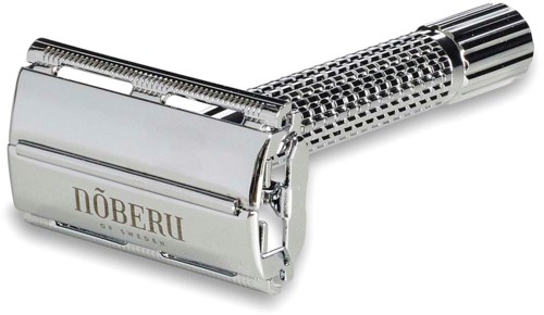 A shiny, silver safety razor with a textured handle and the brand name 'NÖBERU' on the head.