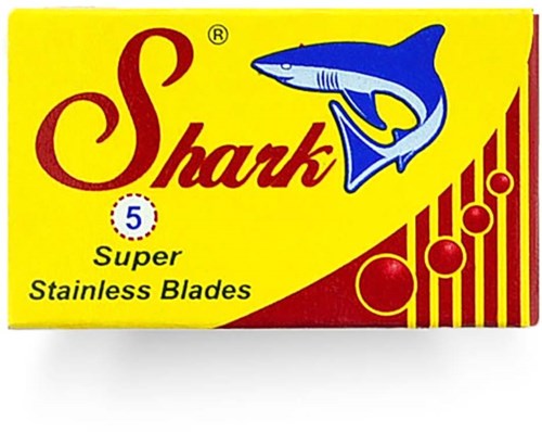 A box of Shark brand super stainless blades with a shark logo and yellow and red colors.