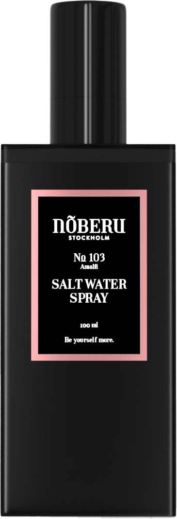 Eine schwarze Flasche mit rosa Etikett, die Salzspray sagt, hergestellt von Doerlu Stockholm.