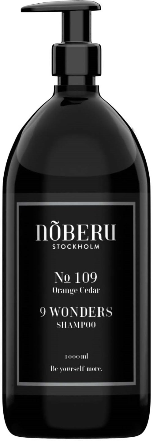 Schwarze Shampoo-Flasche mit weißem Text, beschriftet 'NöBERU Stockholm' und 'No 109 Orange Cedar 9 Wonders Shampoo'.