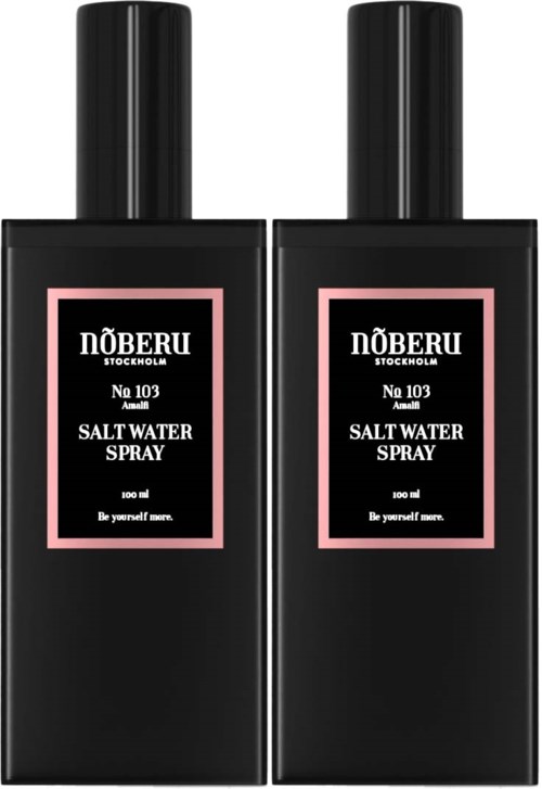 Zwei schwarze Flaschen mit Kochsalzspray, pinke Etiketten und schwarzen Kappen.
