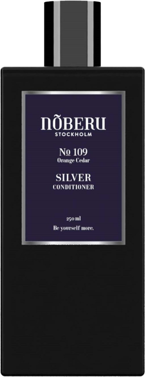 Eine schwarze Flasche mit lila Etikett, silberner Kappe und weißem Text für Shampoo oder Conditioner.