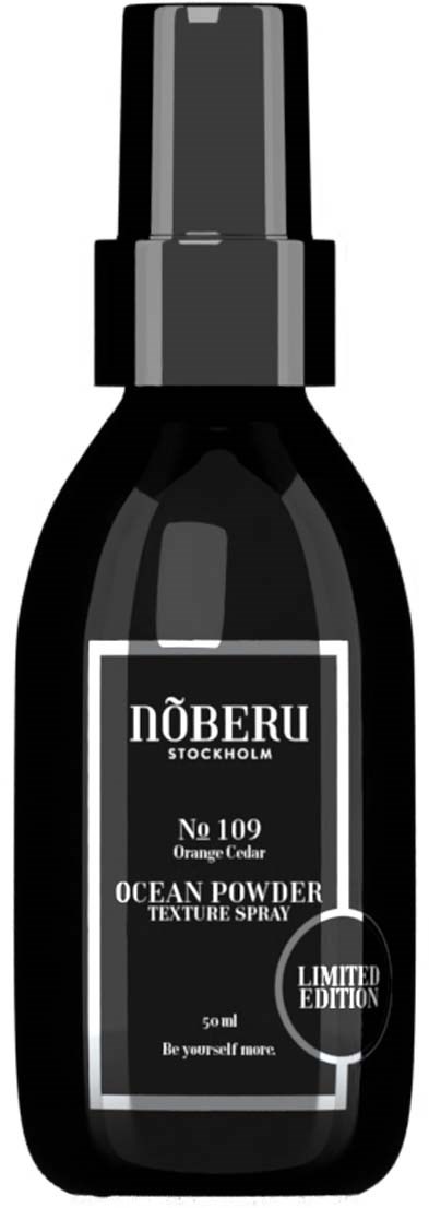A black spray bottle labeled Noberu, Ocean Powder scent, limited edition, 50ml, with a spray nozzle.