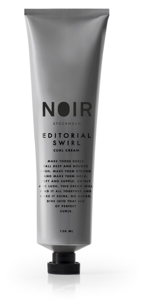 A silver tube of curling cream labeled Noir Editorial Swirl with black text.