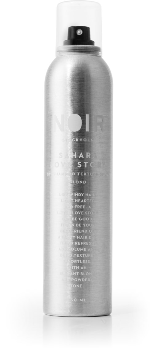 A tall silver spray bottle with a white lid and black spray nozzle, possibly a hair or body spray.
