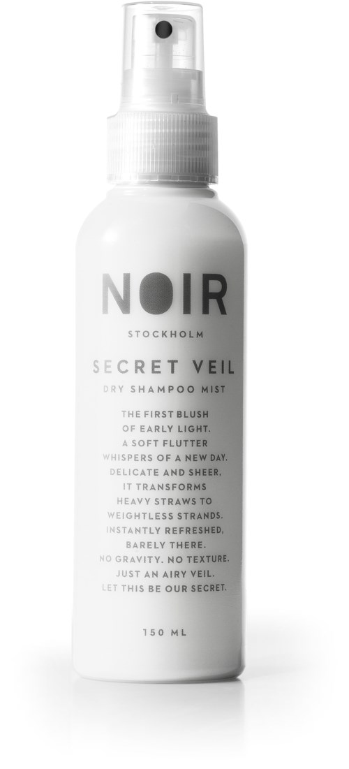 A white spray bottle with black text, labeled 'NOIR' and 'Secret Veil Dry Shampoo Mist'.
