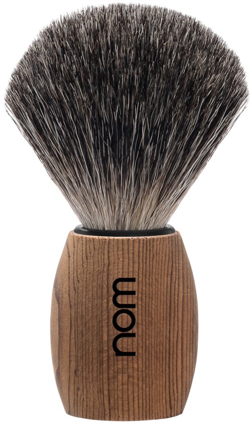 A shaving brush with a wooden handle and black and white bristles.