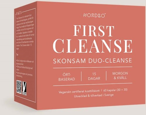 En rosa box märkt 'First Cleanse' med information om en detoxprodukt, inklusive 'Duo-Cleanse', 15 dagar och veganska kapslar.
