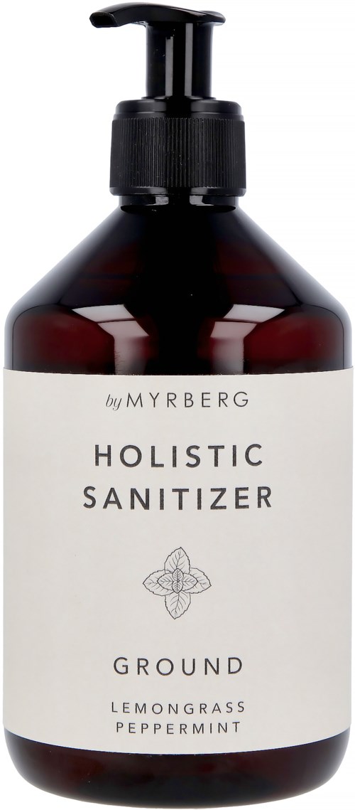 Eine dunkle Flasche mit Pumpe, Beschriftung 'Holistic Sanitizer' mit Zitronen-, Gras- und Pfefferminzduft.