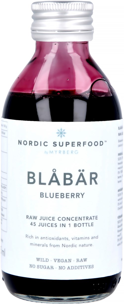 A small glass bottle with a silver cap, filled with dark purple juice, labeled as blueberry juice, from Nordic Superfood.