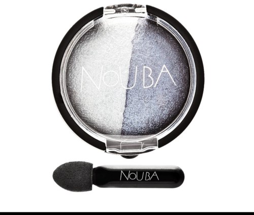 A compact with two shades of eye shadow and a small applicator brush, all in a round container.