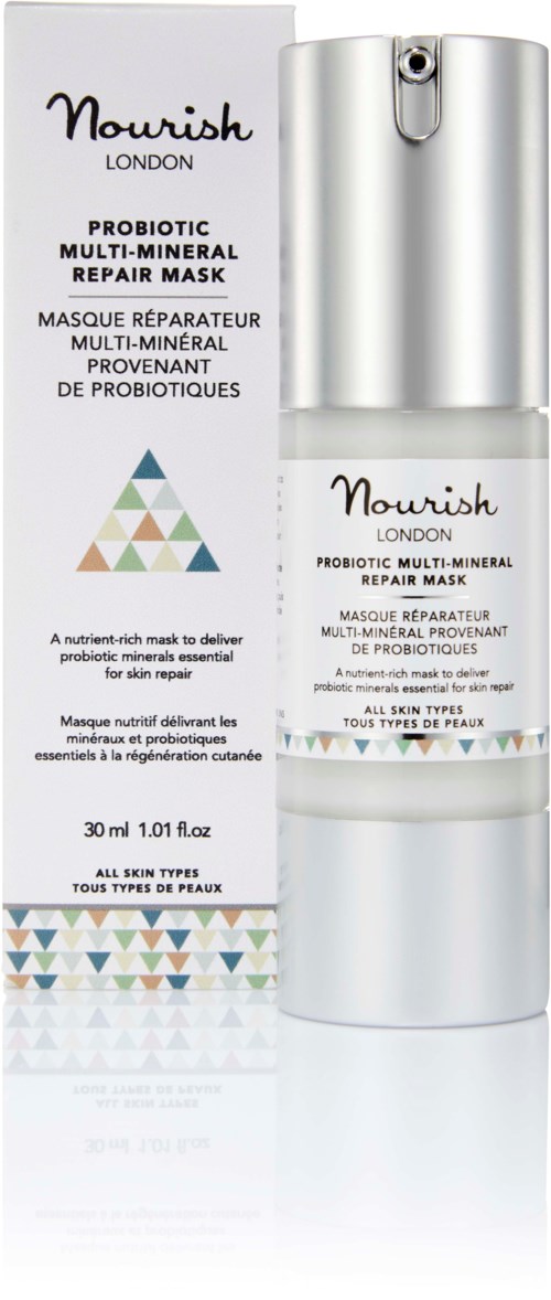 Eine Flasche von Nourish London probiotischer Multi-Mineral-Reparaturmaske mit einer Box daneben, beide beschriftet.