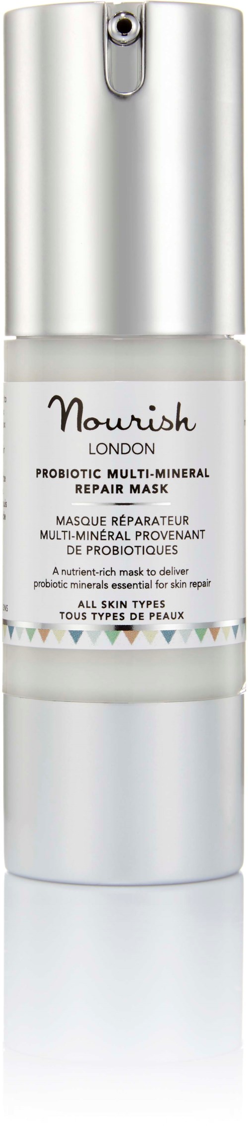Eine weiße und silberne Flasche mit Pumpe, beschriftet 'Nourish London' probiotische Hautreparaturmaske für alle Hauttypen.