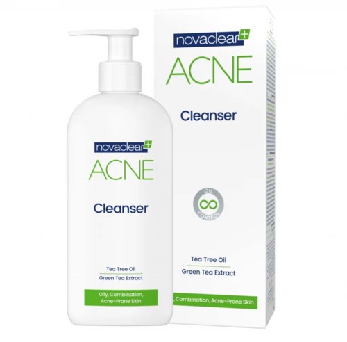A white bottle with a pump and a box both label it as acne cleanser with tea tree oil and green tea extract.