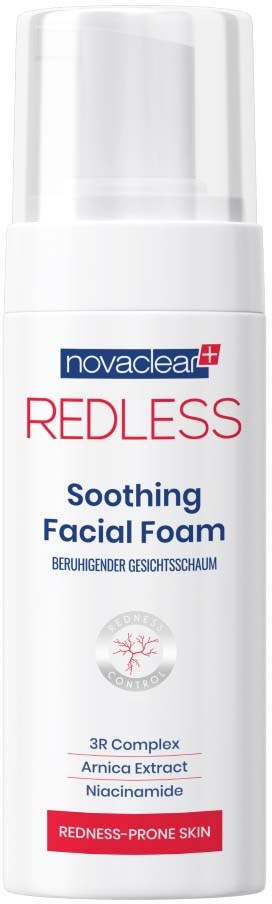 A white spray can label for calming facial foam, with red, blue, and black text, and a small pink effect.