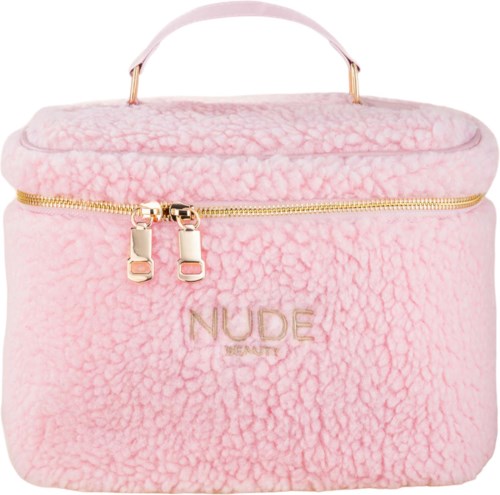 A pink fluffy bag with a gold zipper and handle, showing the words "NUDE BEAUTY" embroidered on it.