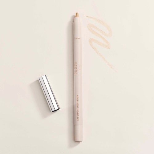 A beige eyeliner pen with a silver cap and a swatch of color on a light background.