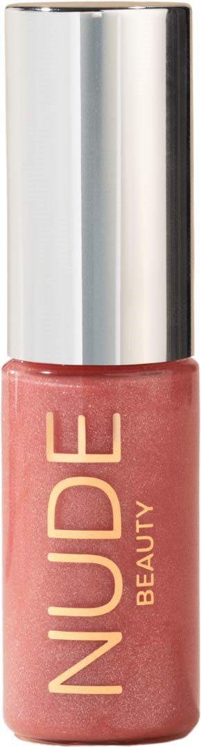 A pink nail polish bottle with gold lettering and a shiny silver cap.