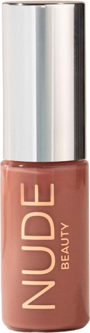 A nail polish bottle with a metallic cap and nude color. The label reads "NUDE BEAUTY."