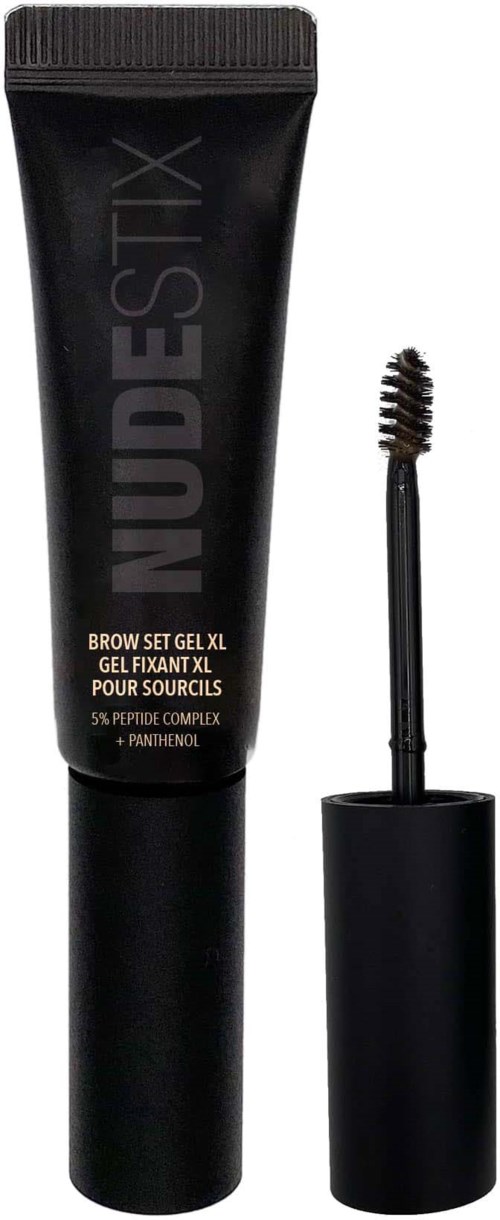 Een zwarte tube wenkbrauwgel met een borsteltje ernaast, gemerkt NUDestix, voor wenkbrauwstyling.
