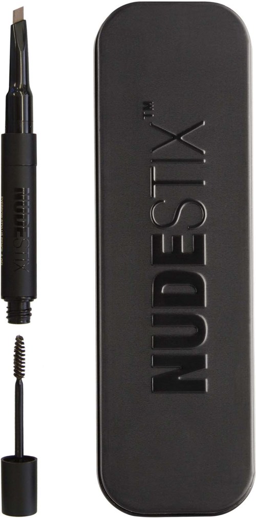 Ein schwarzer Make-up-Stift mit Deckel und einem separaten Spoolie-Bürste, zusammen mit einem schwarzen Etui mit der Aufschrift 'NUDESTIX.'