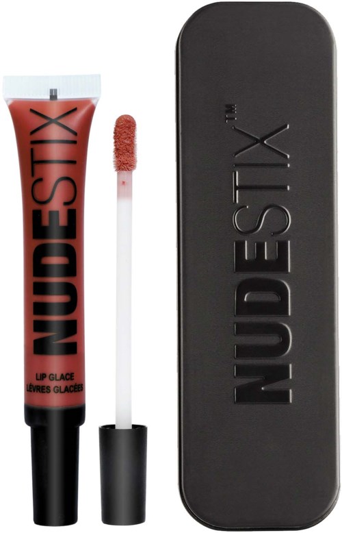 Lip gloss in a tube with a wand applicator, label says 'NUDESTIX'. Comes with a black case.