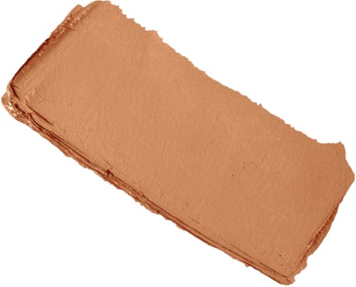 Een rechthoekige block make-up of klei in beige of lichtbruin met ruwe, ongelijke randen.