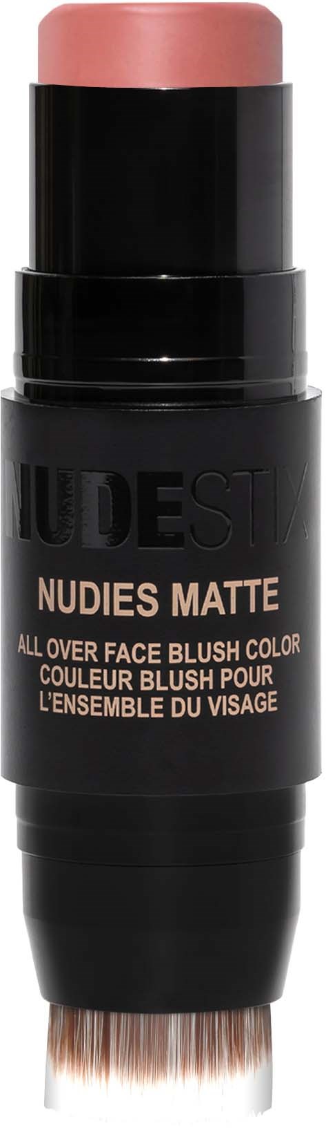 Een zwarte cylindrische make-upstift met roze blush bovenop, gelabeled 'NUDESTICK NUDE MATTE'.