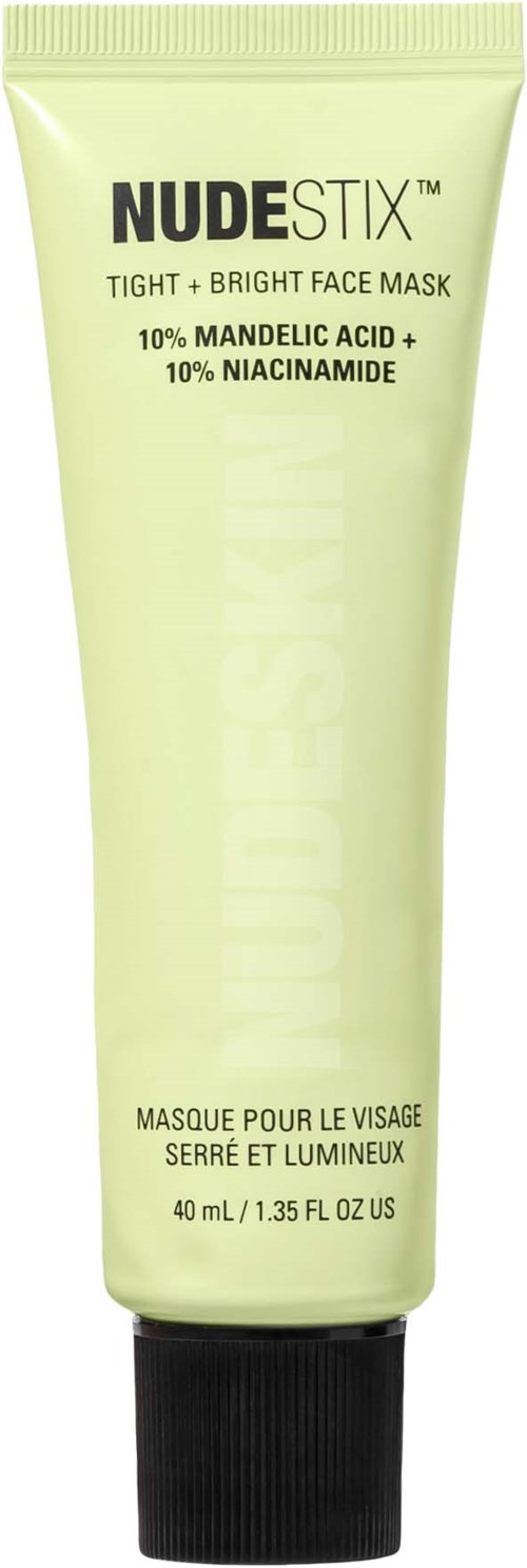 Eine hellgrüne Tube mit schwarzem Deckel, gekennzeichnet 'NUDESTIX', enthält eine Gesichtsmaske mit Mandelsäure und Niacinamid.