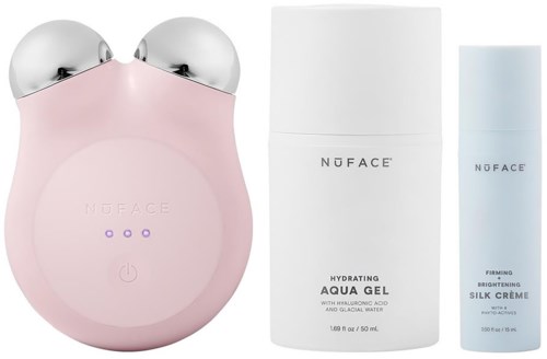 A pink device with two silver balls, and two white bottles labeled Nuface and skincare products.