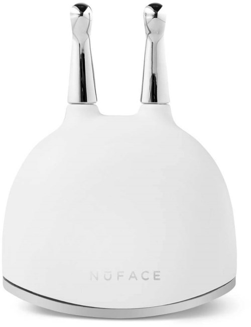 En vit enhet med två metalliska antenner på toppen, märkt 'NUFACE', troligen en ansiktsbehandling eller hudvårdsapparat.