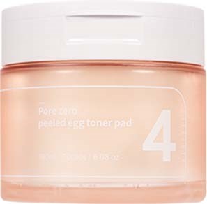 Een klein potje met label 'pore defining' en een roze tint, genummerd 4, waarschijnlijk een huidverzorgingsproduct.