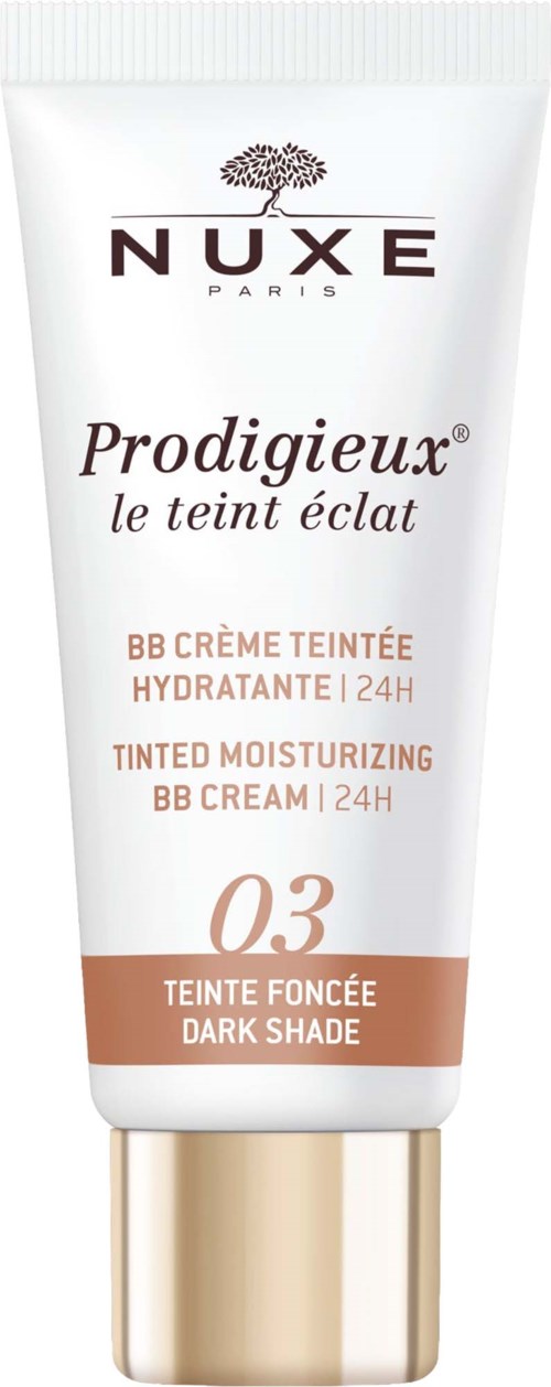 Nuxe Prodigieux BB-cream i mørk nyanse, fukter og gir 24 timers dekning, med beige emballasje og gullhett.