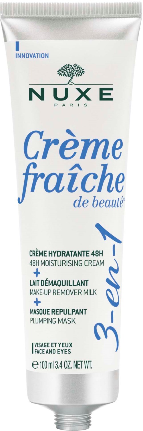 En vit tub med Nuxe Crème Fraîche med blå och gröna etiketter, nämner 48 timmars återfuktning, makeupborttagning och en fyllande mask.