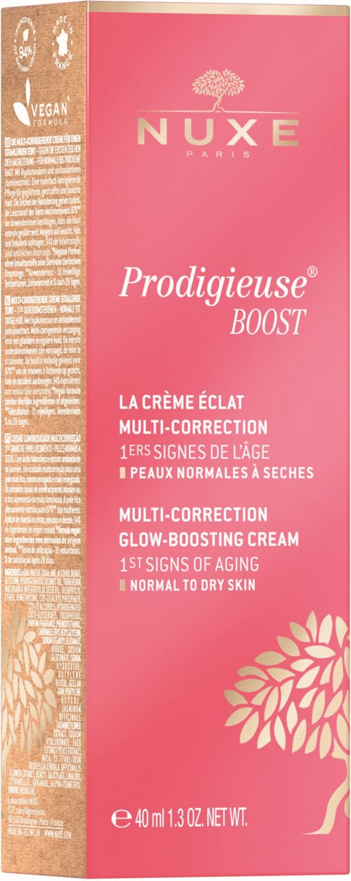 Pink box with NUXE logo, words Prodigeuse Boost, and description of glow-boosting cream for dry skin.