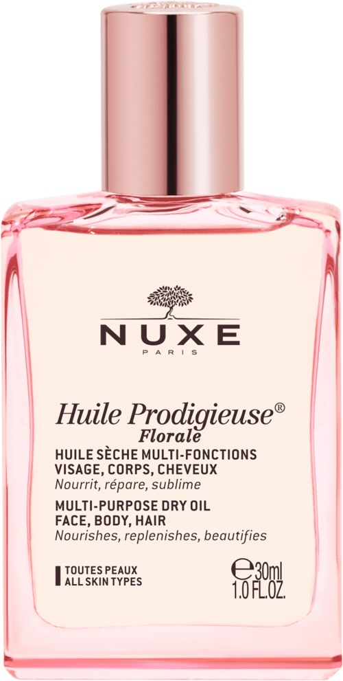 Pink bottle of Nuxe Huile Prodigieuse Florale dry oil for face, body, and hair. Contains 30ml. All skin types.