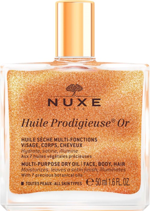 Eine luxuriöse orange-goldene Flasche Nuxe Huile Prodigieuse Or Trockenöl mit glänzendem Verschluss.