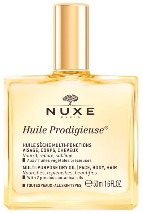 Eine gelbe Flasche mit goldener Verschlusskappe enthält Nuxe Huile Prodigieuse, ein Mehrzweck-Öl für Gesicht, Körper und Haare.