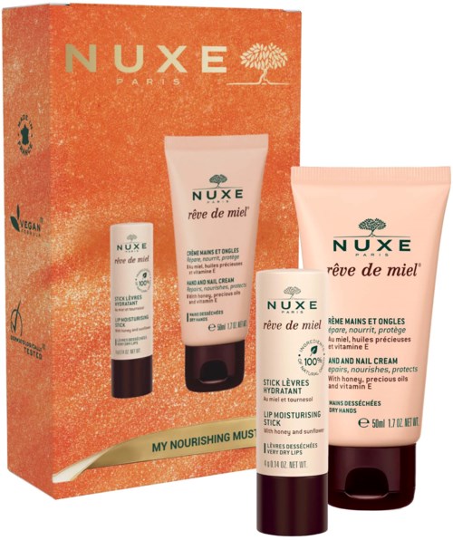 Nuxe Rêve de Miel-set med handkräm, nagelkräm och läppbalsam i orange förpackning.