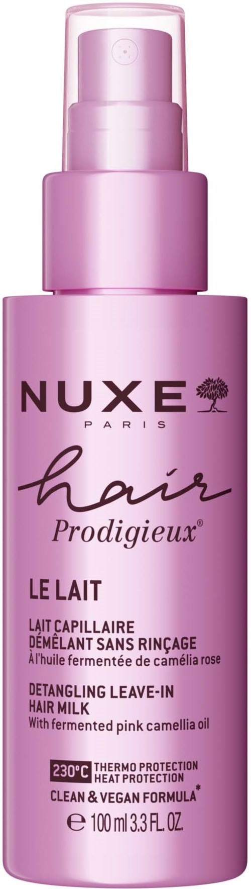 A pink bottle of Nuxe hair leave-in milk with a spray pump, labeled for detangling with pink camellia oil.