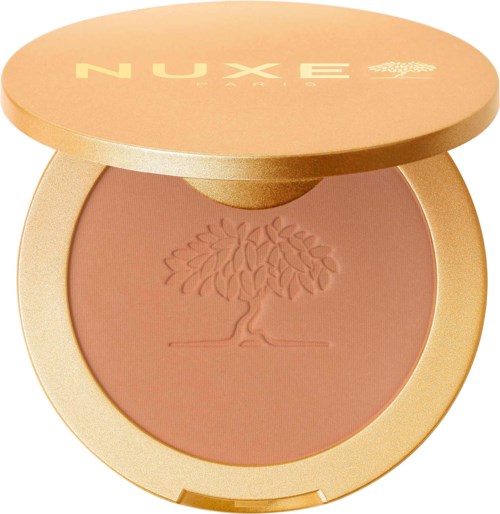 A compact features a peach-colored blush with a tree logo embossed on it.