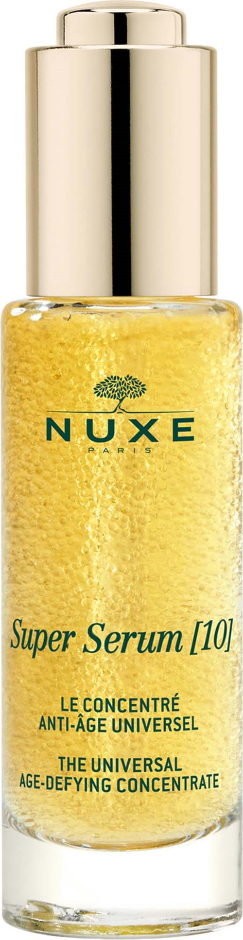 En gul serumflaska med guldlock, märkt NUXE Super Serum med anti-ålders påståenden.