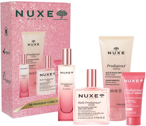 Nuxe Prodigieux Floral presentset med rosa och vita flaskor, krämrör och rosa förpackningsbakgrund.